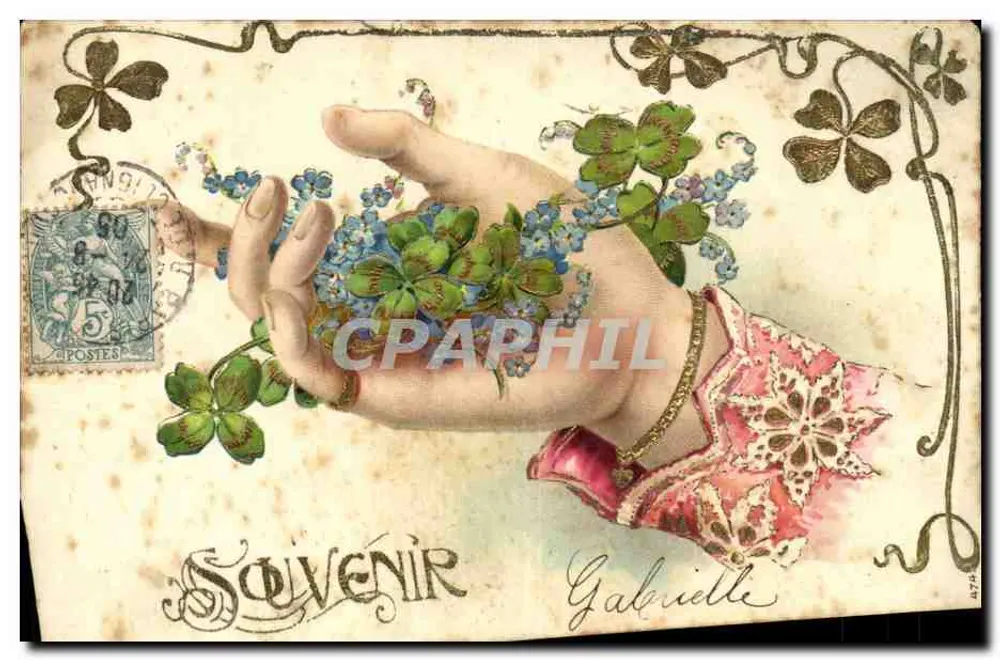 Mão segurando trevo e flores — Lembrança Gabrielle — editor não visível - Frente