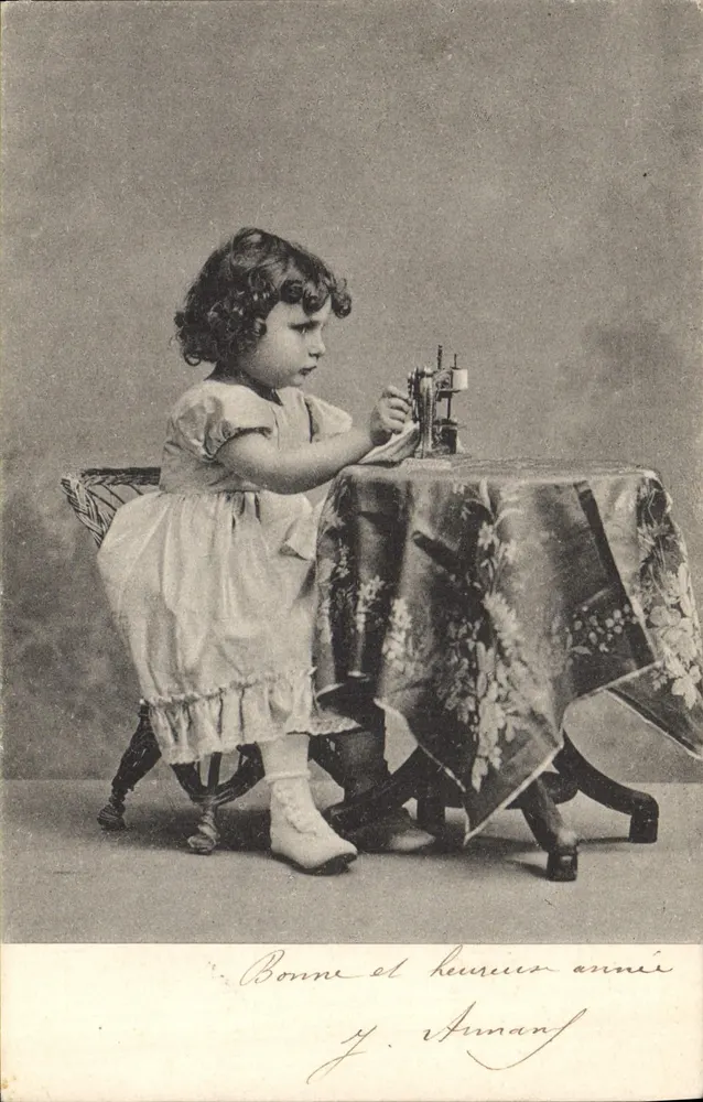 Menina brincando com uma máquina de costura — Y. Annan — P. F. B. Série 3383 - Frente