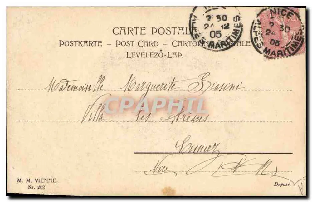 Joven mujer sosteniendo un arbusto de visco — Feliz Navidad — M. M. Vienne, n° 202 - Reverso