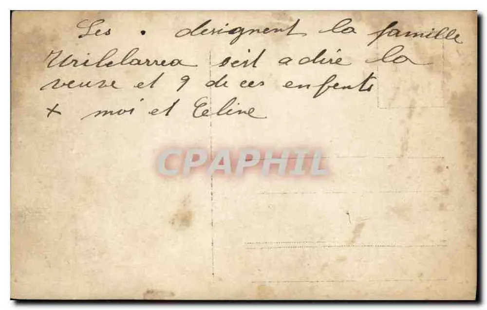 Grupo familiar em frente a um portão — família Uribe Larrea — cerca de 1930 - Verso