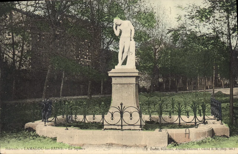 Lamalou-les-Bains - O Square — estátua de mármore — E. Duchêne, ourives, Avenida Charcot - Frente