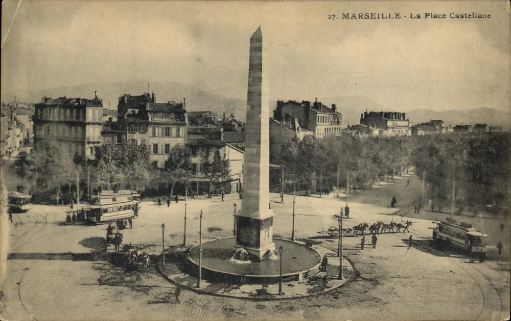 Marseille - A Praça Castellane — Obélisco central, trams e carruagens — editor: Ateliers de Phototypie Guerende, n°27 - Frente