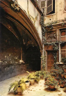 Cour intérieure d'une vieille maison — arc brisé et portail en bois — Imprimerie Combier, n° 69.264