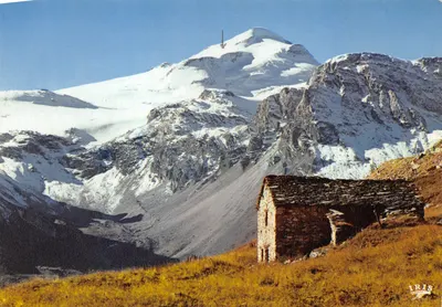 La Grande Motte — sommet enneigé avec cabane de montagne — éditeur IRIS