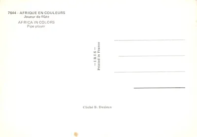 Młody Afrykanin — grający na drewnianej flocie — seria 7644, wydawca IRIS — Rewers