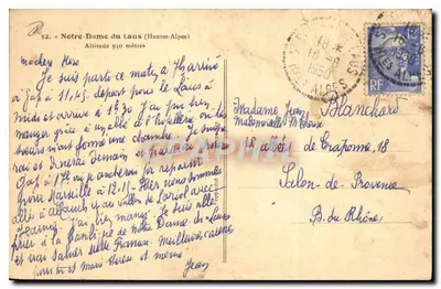 Notre-Dame du Lans (Hautes-Alpes) — vue du village avec église et colline aride — éditeur non visible — Verso