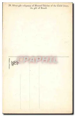Pequena cápsula de prata dourada da Béthérèse do Menino Jesus — oferecida pelo Brasil — n°29 — Verso