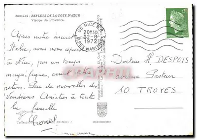 Widok ulicy z kamieniem pod łukiem — rośliny wspinające się — wydawca IRIS — Rewers