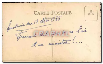 Para z psem — przed szklanym budynkiem — karta pocztowa datowana 1935 — Rewers