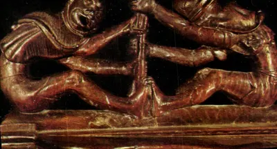 Accoudoir de Stalle (1535) — Rivalidade de Dois Monges se Disputando a Cruz — Edição « Europ » - Pierron