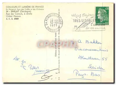 Widok z Sarlat-la-Canéda — wąska ulica z łukami i balkonem — Wydawnictwo Sztuki Yvon — Rewers