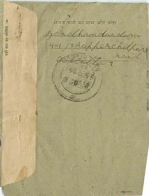 Carta postal indiana — texto em devanagari, selo e carimbo de Cuttack — destinatário em Jaipur — Verso
