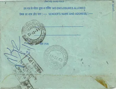 अंतर्देशीय हिंदी पोस्टकार्ड — हिंदी में लिखा टिम्बर 20 अन्ना, पोस्ट ऑफिस के सील के साथ — पीछे
