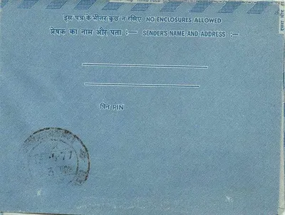 Carta postal interna indiana — texto em escrita devanagari — selo de 20 annas — Verso