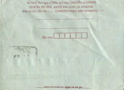 Carta postal indiana — texto manuscrito em escrita devanagari — selos de 25 e 75 annas — Verso