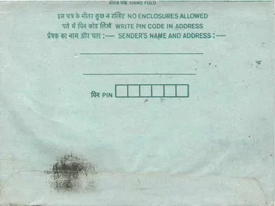 Cartão postal interno indiano — selo de 35 p. — destinatário em Jhansi, Uttar Pradesh — Verso