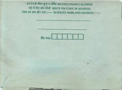 Tarjeta postal interior india — sello de 35 annas — destinatario en Ahmednagar — Reverso