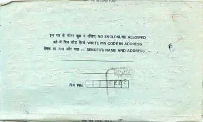 Carta postal interna indiana — texto em escrita devanagari — carimbo de 75 pence — Verso