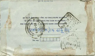 Tarjeta postal interior india — sello 15 p. — destinatario en Delhi — Reverso