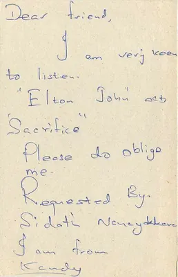 Tarjeta postal Sri Lanka — petición de música — editor Sri Lanka — Reverso