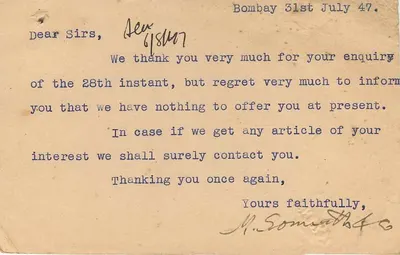 Jhansi — Bombay — komercyjna kartka pocztowa firmy M. Somnath & Company — Rewers