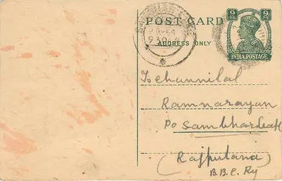 Carta postal manuscrita — escrita cursiva em língua indiana — verso: destinatário em Rajputana, selo de 9 p. e carimbo 'JINDLA 950 M' — Verso