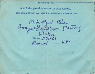 Carta postal interna indiana — texto em hindi — selo de 20 annas — carimbo de Lucknow — Verso