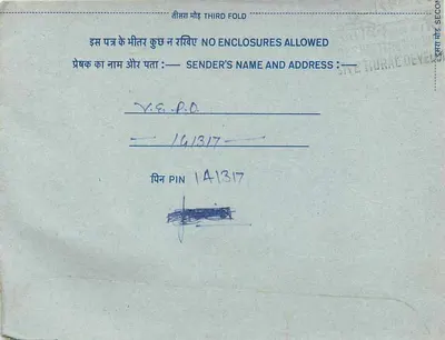 Carta postal interna indiana — selo de 20 annas, obliteração parcial — destinatário em Nova Deli — Verso
