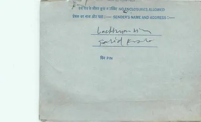 Carta postal interna indiana — selo azul de 20 annas — destinatário Lachhman N. Patel — Verso