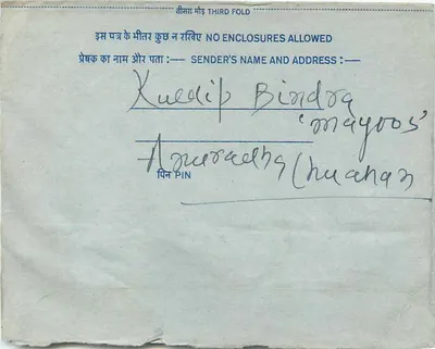 Carta postal interna indiana — texto em devanagari — selo de 20 annas — Verso