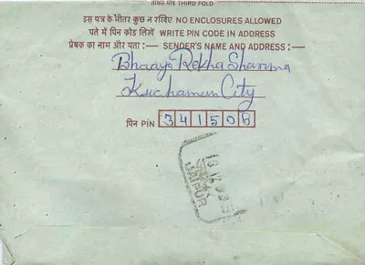 Carta postal interna indiana — editor: India Post, número de série não visível — Verso