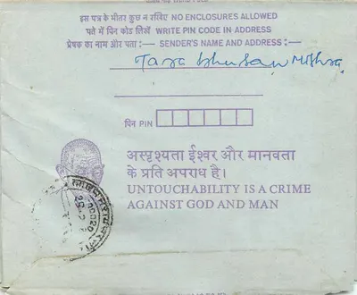 Carta postal interna indiana — selo de 35 annas — texto contra a untouchabilidade — destinatário em Calcutá — Verso
