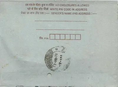 Carta postal interior indiana — selo de 75 pence, carimbo 'INDIA' — verso com carimbo de envio — Verso