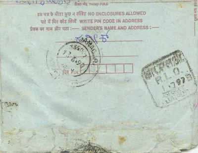 Carta postal interior indiana — texto manuscrito e selos — editor: India Post — Verso
