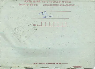 Carta postal interior indiana — selo de 75 pence, carimbo visível — verso com instruções de abertura e espaço para o endereço do destinatário — Verso