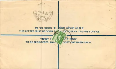 Busta registrata — India — 1961 — timbro verde e sello postale — Verso