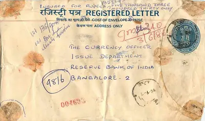 Tarjeta postal de Bombay — Carta certificada para la Banco de la Reserva de la India en Bangalore — sellos 'Reactor Atómico' y 'Canara Bank' — Reverso