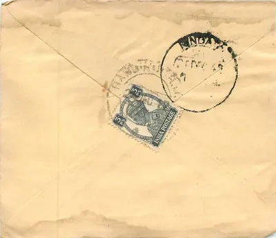 Mohilall Chhaplall Hindamcity — cartão postal indiano com selo e carimbo — Verso