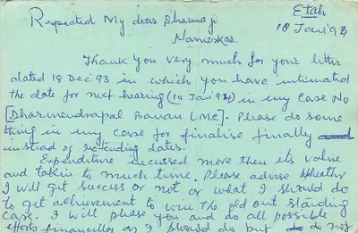 Correspondência familiar — Étah, Índia — carta postal com selo de 15 rupias — Verso
