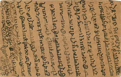 Carta postal indiana — texto em escrita bengali — selos e carimbos de Warwar — Verso