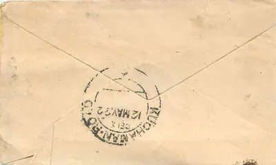 Indyjska pocztówka — tekst w pismie devanagari — znaki pocztowe i nadruk z Ruohamano, Cejlon, 12 marca 1922 — Rewers