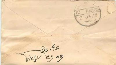 Indyjska karta pocztowa — adres w pismie devanagari — pieczątka zielona 'HALF ANNA' i znak nadrukowy — Rewers