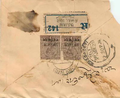 Gwalior — Zarejestrowana korespondencja do Bombaju — znaki pocztowe i pieczątki z Gwalior — Rewers