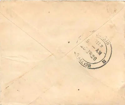 Carta postal indiana — texto em escrita local — carimbo de diretório de 1928 — Verso