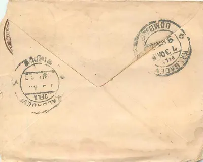 Ujjain — Bombay — timbro indiano da 1 anna e cancelleria postale — Verso