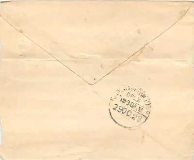 Carta postal de Delhi — selo da Índia e carimbo postal — destinada a Halrapatonem — Verso