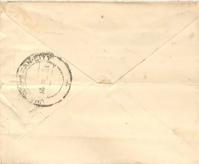 Antieke ansichtkaart van Wallior — tekst in devanagari — zegel van een anna — poststempel van Wallior — Achterkant