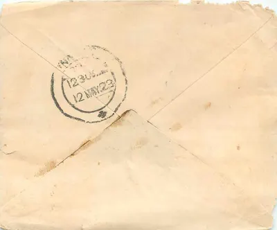 Indian postcard — text in Devanagari script — one anna postage stamp — postmark '12 MAY 23' — Back