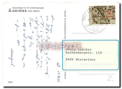 Bad Scuol — widok z placu sportowego Trü z Lischangruppe — DIO FEUERSTEIN & CO. — Rewers