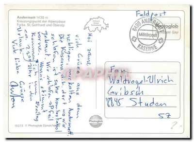 Andermatt — widok budynku głównego, pociągu i kościoła — Photoglob — Rewers